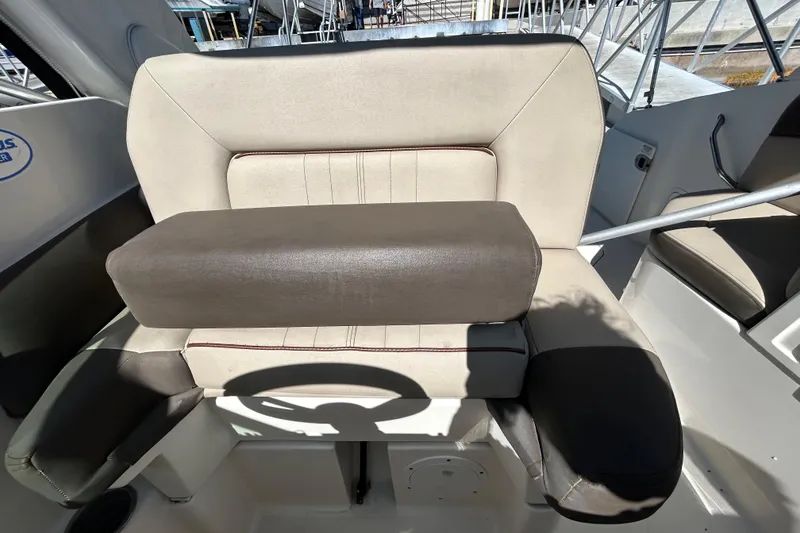 Slide: The Image of Interior cabin of 2014 Sea Ray Sundancer 260 with sunlight streaming through window. - 60