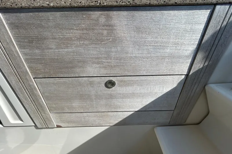 Slide: The Image of 2014 Sea Ray Sundancer 260 bathroom with sink, toilet, and shower curtain. - 67