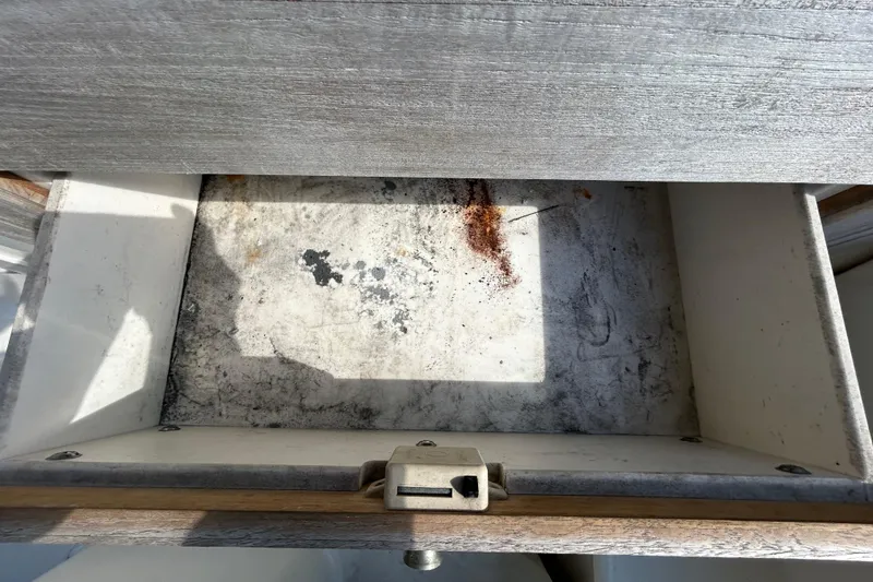 Slide: The Image of Compact bathroom in 2014 Sea Ray Sundancer 260 with sink and toilet. - 69