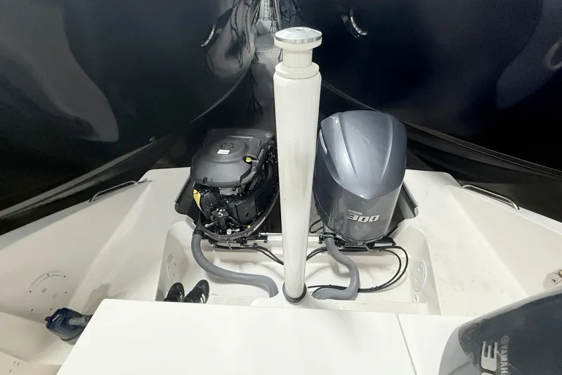 Slide: The Image of 2018 Pursuit DC 325 Dual Console boat with Yamaha 300 engine, rear view. - 15