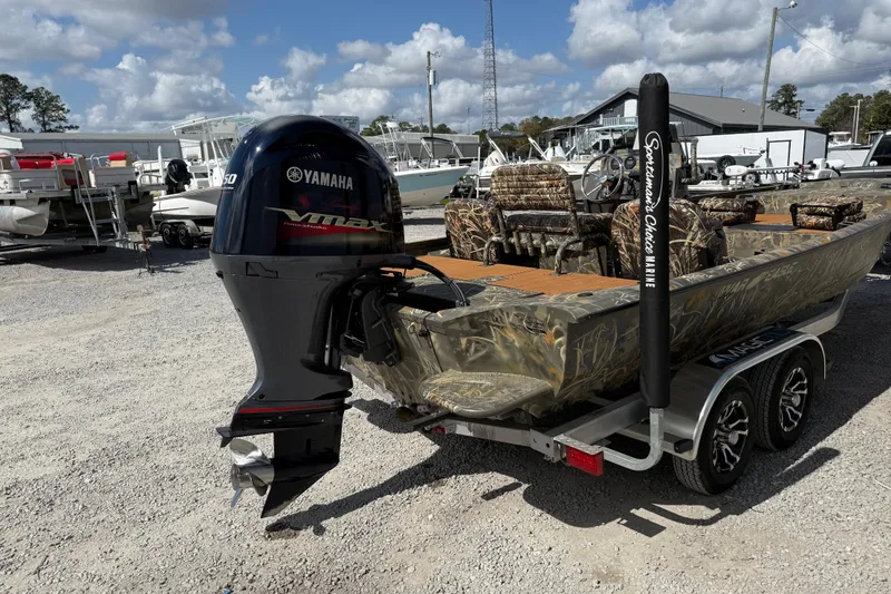 Slide: The Image of 2022 War Eagle 2170 Blackhawk boat with Yamaha VMAX engine on a trailer. - 10