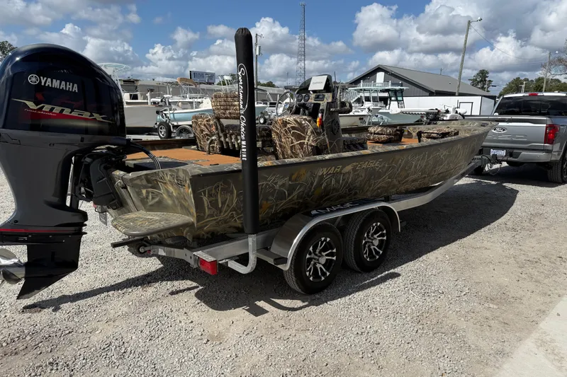 Slide: The Image of 2022 War Eagle 2170 Blackhawk boat with Yamaha VMAX engine on trailer. - 11