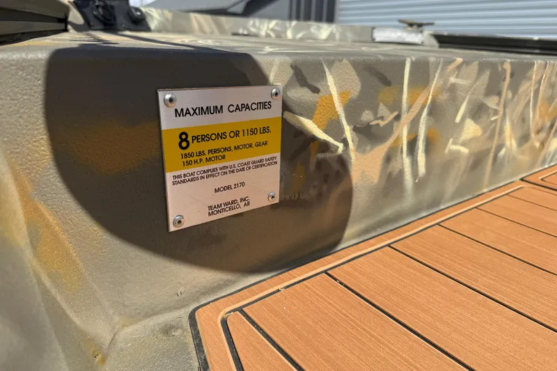 Slide: The Image of 2022 War Eagle 2170 Blackhawk boat capacity plate, 8 persons or 1150 lbs limit. - 20