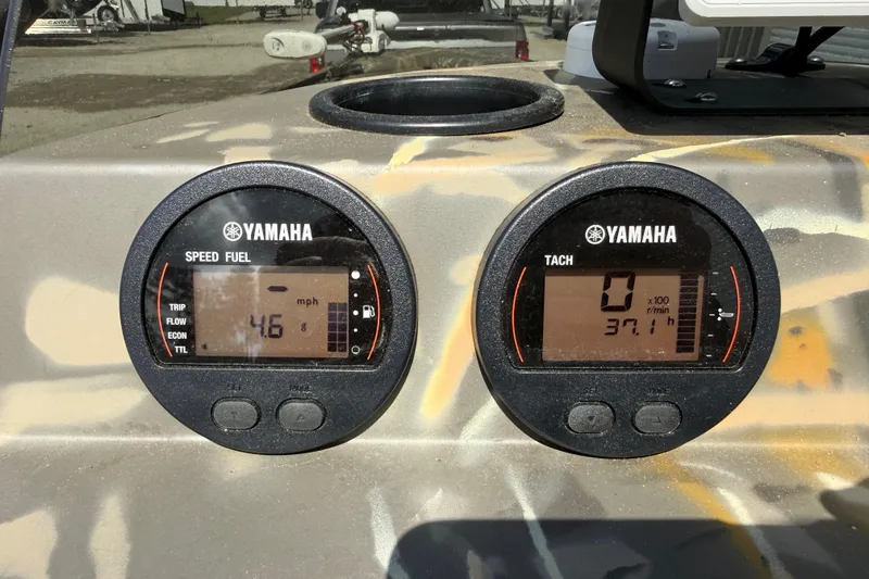 Slide: The Image of Yamaha speed and tachometer gauges on 2022 War Eagle 2170 Blackhawk boat dashboard. - 33