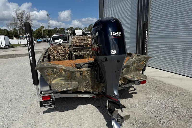 Slide: The Image of 2022 War Eagle 2170 Blackhawk boat with Yamaha 150 engine on trailer. - 6