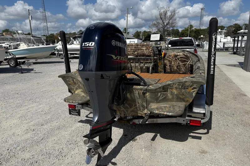 Slide: The Image of 2022 War Eagle 2170 Blackhawk boat with Yamaha 150 engine on trailer. - 8
