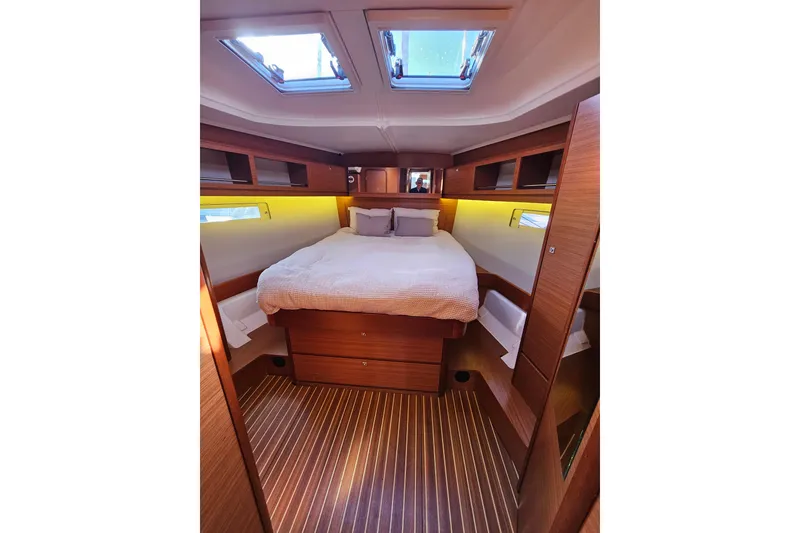 Slide: The Image of Luxurious cabin interior of 2018 Dufour 460 Grand Large yacht with skylights and wood finish. - 14
