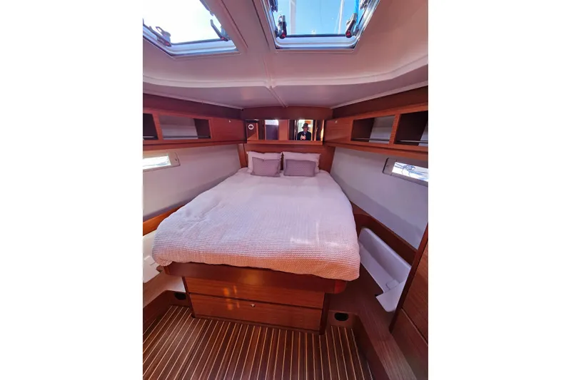 Slide: The Image of Luxurious cabin interior of 2018 Dufour 460 Grand Large yacht with cozy bedding. - 18