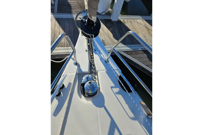 Slide: The Image of Bow of 2018 Dufour 460 Grand Large yacht with anchor chain and winch. - 29