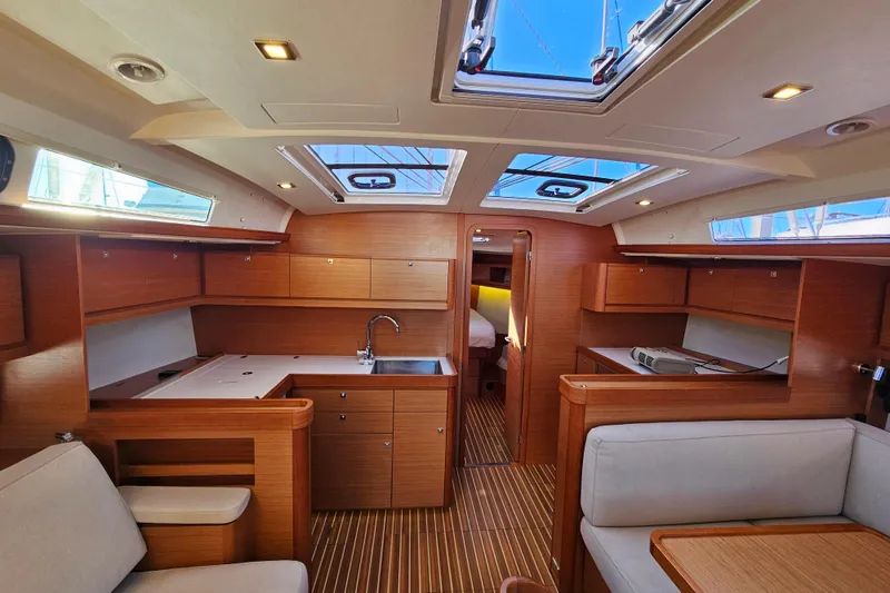 Slide: The Image of Luxurious interior of 2018 Dufour 460 Grand Large yacht with modern wood finish. - 6