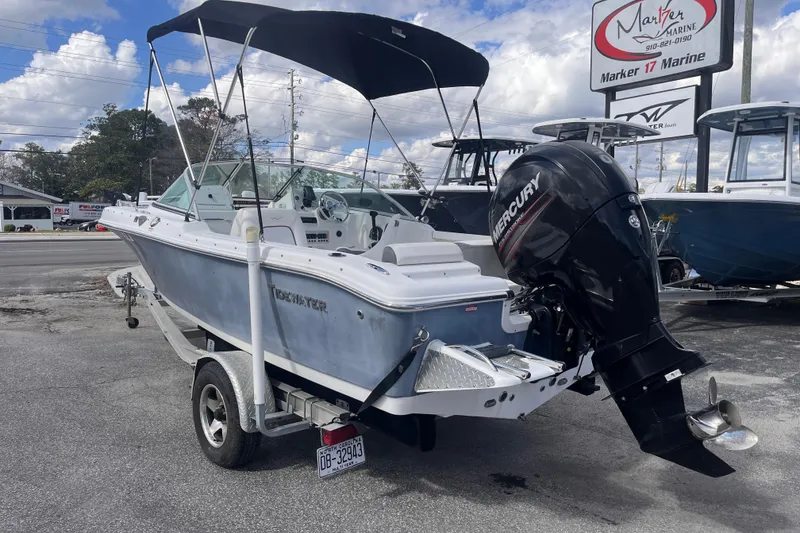 Slide: The Image of 2014 Tidewater 196 DC Explorer boat with Mercury engine on trailer. - 3