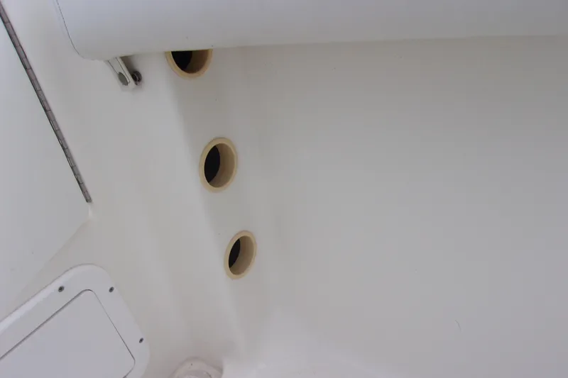 Slide: The Image of Interior view of a 1998 Wellcraft 210 Sportsman boat, showing circular vents. - 11