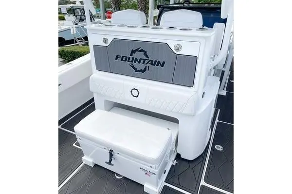 Slide: The Image of 2023 Fountain 34 Tournament Edition boat interior with seating and storage. - 7