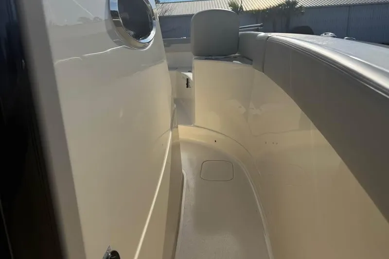 Slide: The Image of 2026 Scout 277 LXF boat interior with sleek design and comfortable seating. - 15