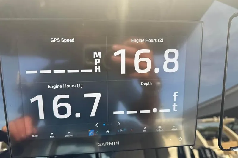 Slide: The Image of Garmin display on 2026 Scout 277 LXF showing engine hours and GPS speed. - 16