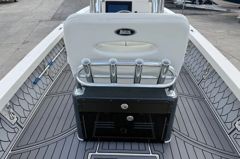 Slide: The Image of 2015 Pathfinder 2600 HPS boat interior with rod holders and custom flooring. - 11