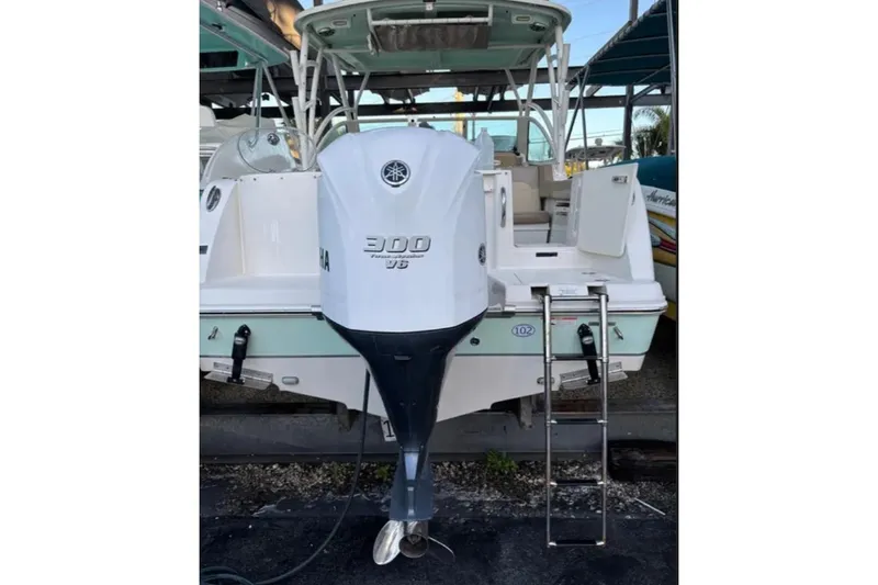 Slide: The Image of 2019 Sailfish 275 DC boat with Yamaha 300 V6 engine and swim ladder. - 5