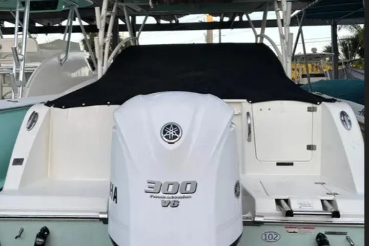 Slide: The Image of 2019 Sailfish 275 DC boat with Yamaha 300 V6 engine, rear view. - 6
