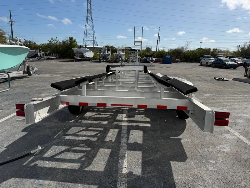 The Image of Boat trailer for Costa Custom Boats 34, year 2025, in parking lot. - 0