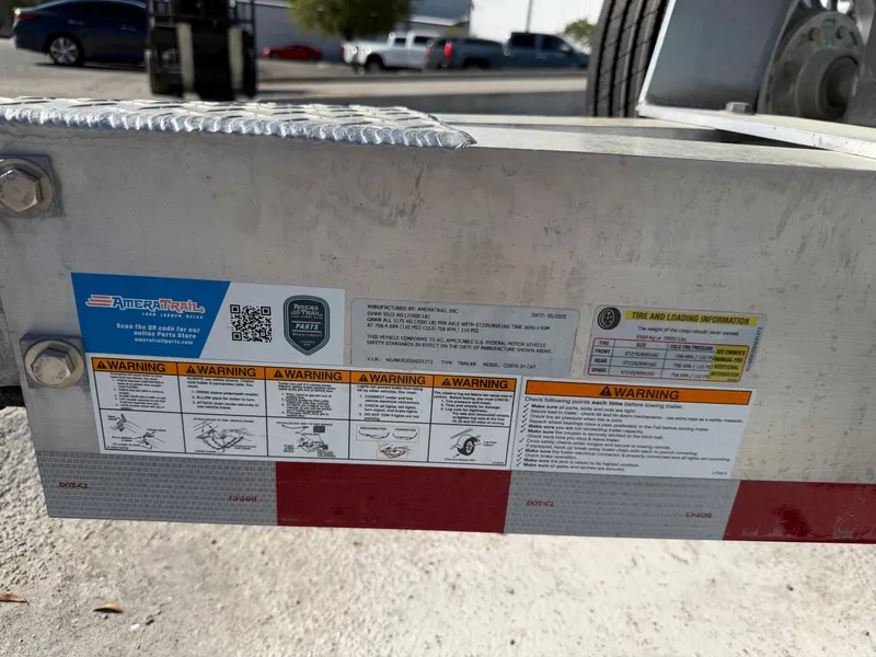 Slide: The Image of Trailer sticker with warnings and loading info, Costa Custom Boats 2025. - 3