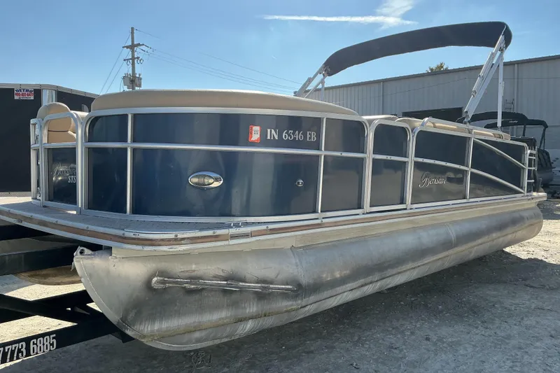 The Image of 2018 Berkshire 23RFC STS Fish pontoon boat with blue exterior and canopy. - 1