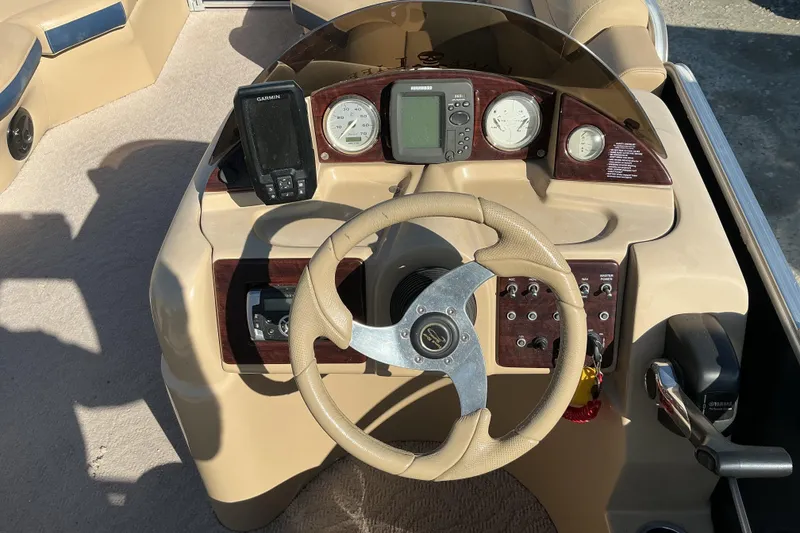Slide: The Image of Steering console of 2018 Berkshire 23RFC STS Fish boat with navigation instruments. - 8
