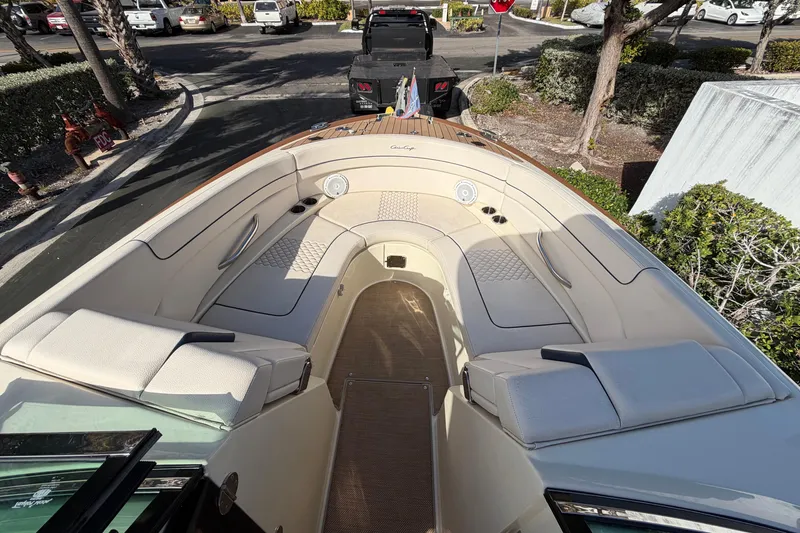 Slide: The Image of 2023 Chris-Craft Launch 28 GT boat interior with luxurious seating and elegant design. - 12