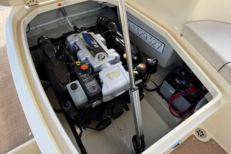 Slide: The Image of Engine compartment of 2023 Chris-Craft Launch 28 GT, showcasing powerful V8 engine. - 14