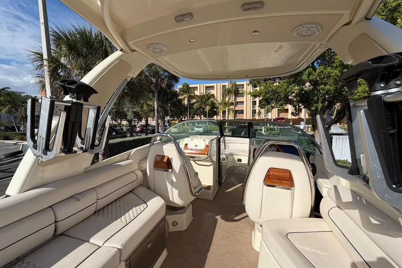 Slide: The Image of 2023 Chris-Craft Launch 28 GT interior with luxurious seating and modern design. - 6