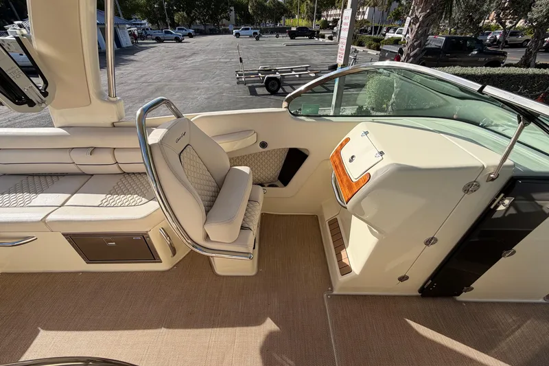 Slide: The Image of 2023 Chris-Craft Launch 28 GT interior with luxurious seating and elegant design. - 7