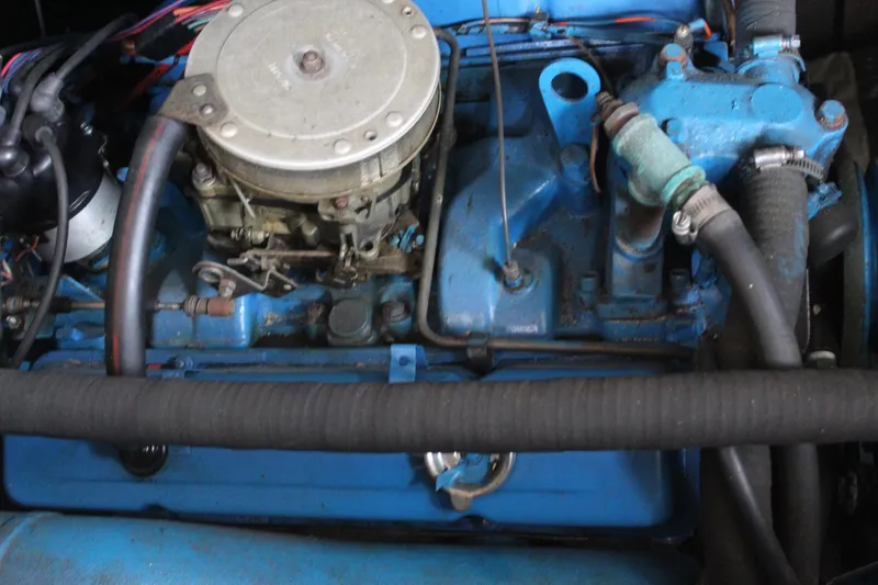 Slide: The Image of 1969 Pacemaker Tricabin engine, blue components, detailed view. - 22