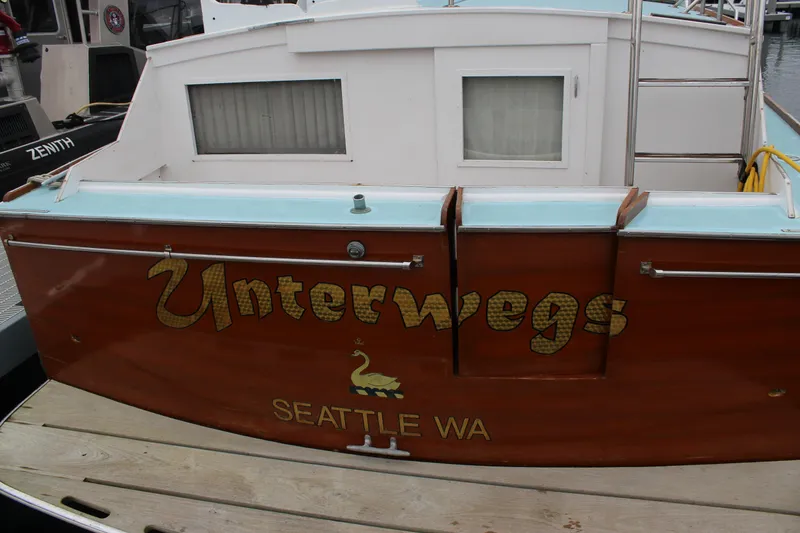 Slide: The Image of 1969 Pacemaker Tricabin boat named "Unterwegs" docked in Seattle, WA. - 3