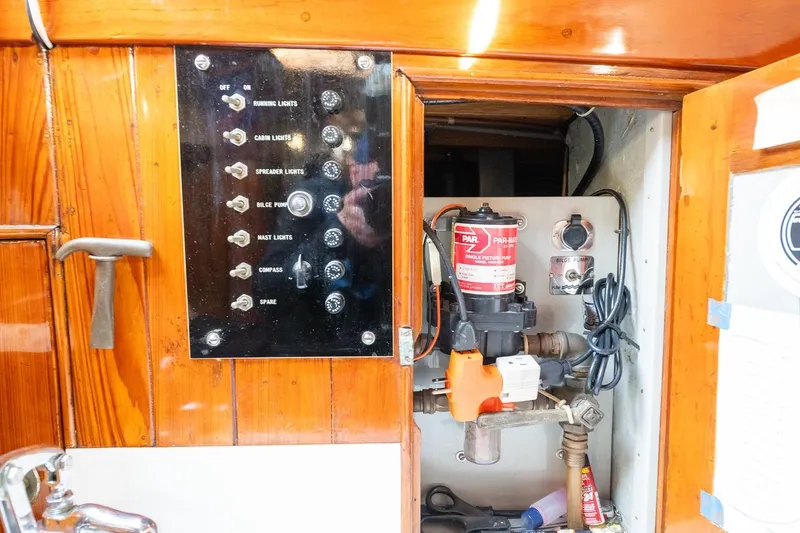 Slide: The Image of Electrical panel and bilge pump system on a 1938 Philip Rhodes Cutter sailboat. - 54