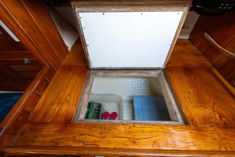 Slide: The Image of Wooden interior storage compartment on a 1938 Philip Rhodes Cutter sailboat. - 58