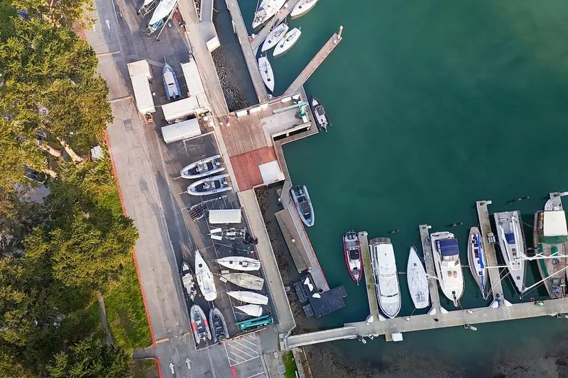 Slide: The Image of Aerial view of marina with boats, including a 1938 Philip Rhodes Cutter. - 73