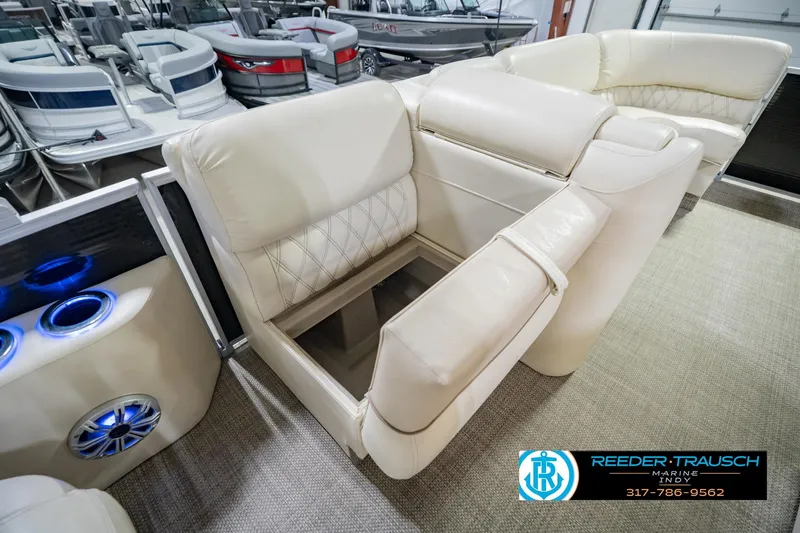 Slide: The Image of Luxurious seating on a 2015 Bennington 2350 RSR pontoon boat, featuring elegant upholstery. - 26