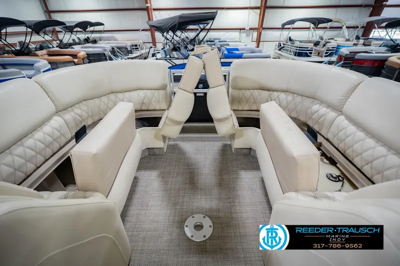 Slide: The Image of Interior of 2015 Bennington 2350 RSR pontoon boat with beige seating. - 30