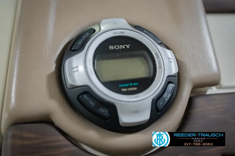 Slide: The Image of Sony marine audio control on 2015 Bennington 2350 RSR boat dashboard. - 35