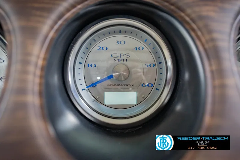 Slide: The Image of Close-up of a 2015 Bennington 2350 RSR GPS speedometer displaying speed in MPH. - 37