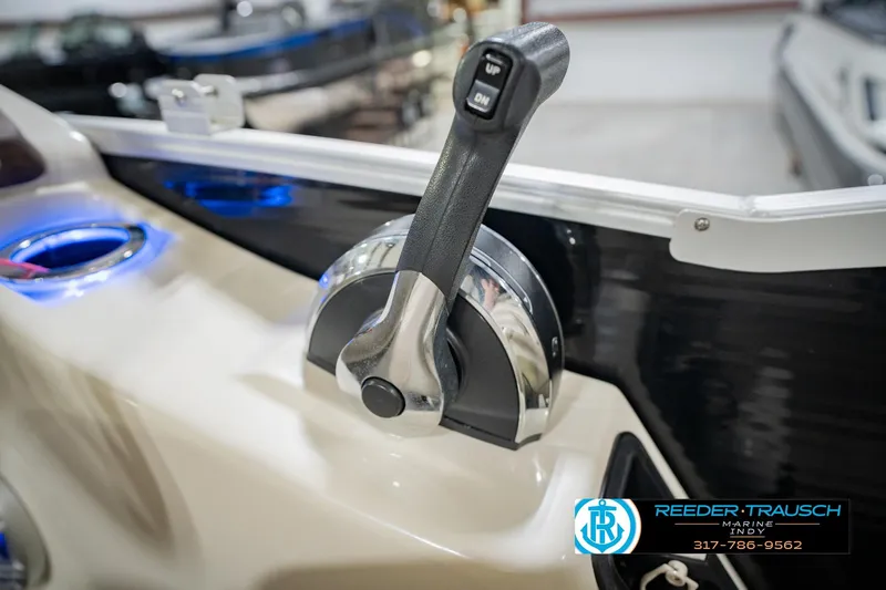 Slide: The Image of Throttle control of a 2015 Bennington 2350 RSR boat with illuminated cup holder. - 41