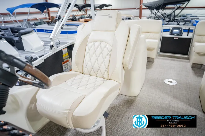 Slide: The Image of Luxurious seating on a 2015 Bennington 2350 RSR pontoon boat, showcasing elegant design. - 42