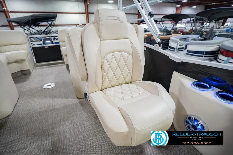 Slide: The Image of Luxurious seating on a 2015 Bennington 2350 RSR pontoon boat, featuring elegant upholstery. - 44