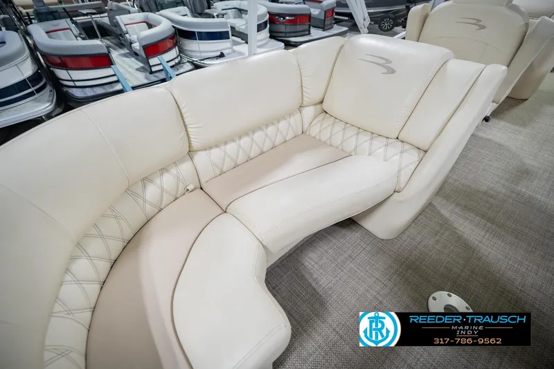 Slide: The Image of Luxurious seating on a 2015 Bennington 2350 RSR pontoon boat at Reeder-Trausch Marine. - 45