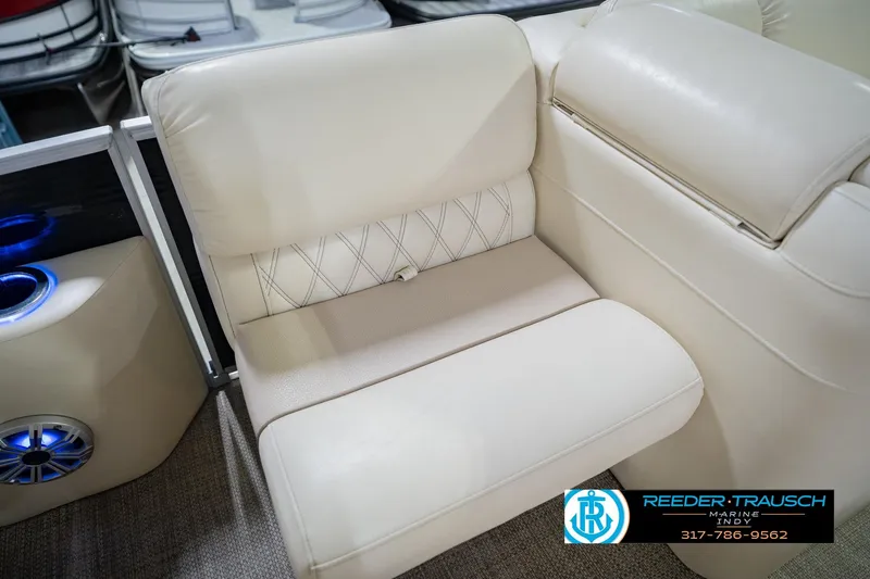 Slide: The Image of Beige seating on 2015 Bennington 2350 RSR boat with cup holder and speaker. - 46