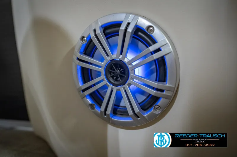 Slide: The Image of Illuminated speaker on 2015 Bennington 2350 RSR boat, featuring blue LED lighting. - 48