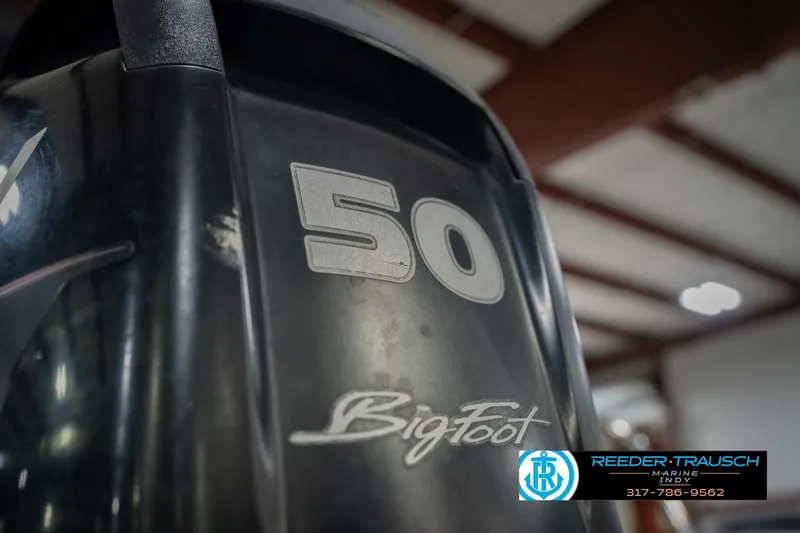 Slide: The Image of Outboard motor with "50 BigFoot" branding, associated with a 2015 Bennington 2350 RSR. - 54