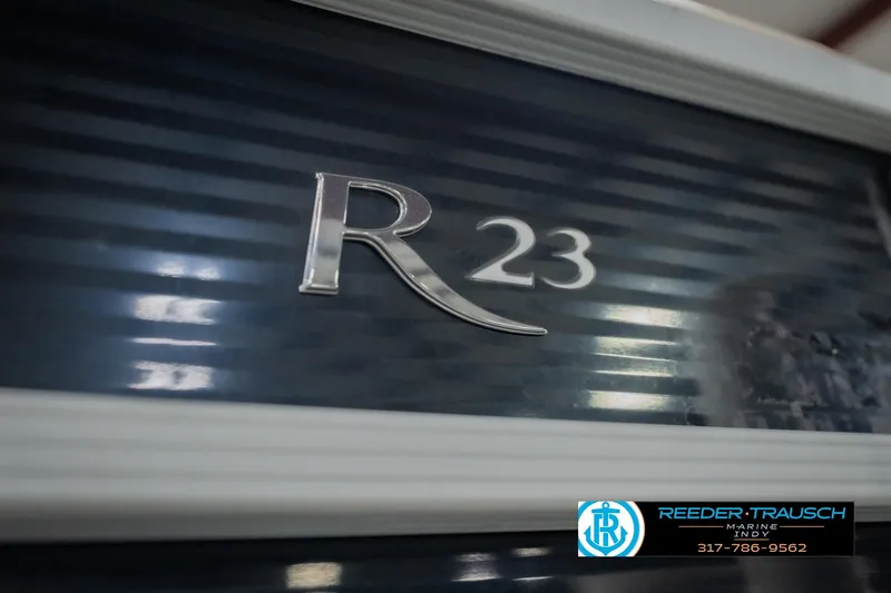 Slide: The Image of Close-up of 2015 Bennington 2350 RSR boat model emblem with R23 marking. - 57