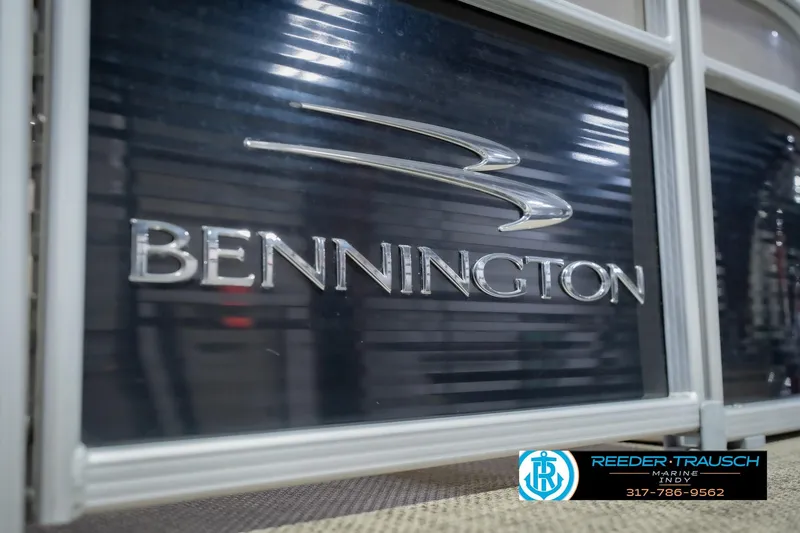 Slide: The Image of Close-up of 2015 Bennington 2350 RSR logo on a boat. - 58