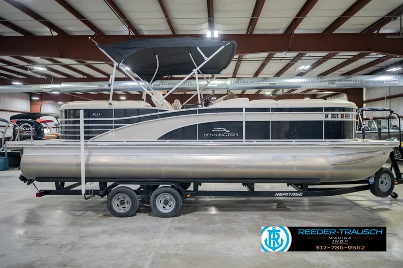 Slide: The Image of 2015 Bennington 2350 RSR pontoon boat on trailer in indoor showroom. - 7