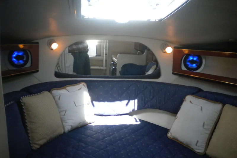 Slide: The Image of Interior of 2002 Sea Ray Sundancer 280 with blue seating and ambient lighting. - 33